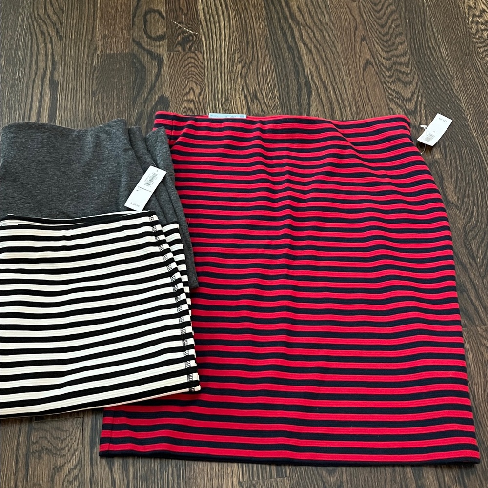 Old Navy 2 Striped and 1 solid Pencil Skirts, size M.